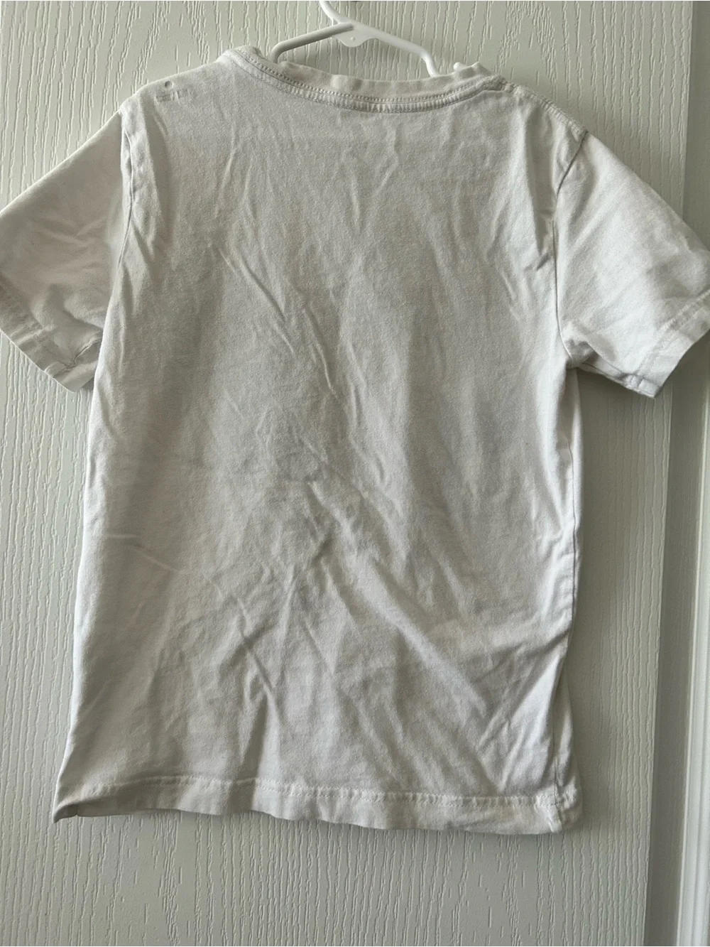 Kids Nike White Graphic Tee with Red & Black Design Small